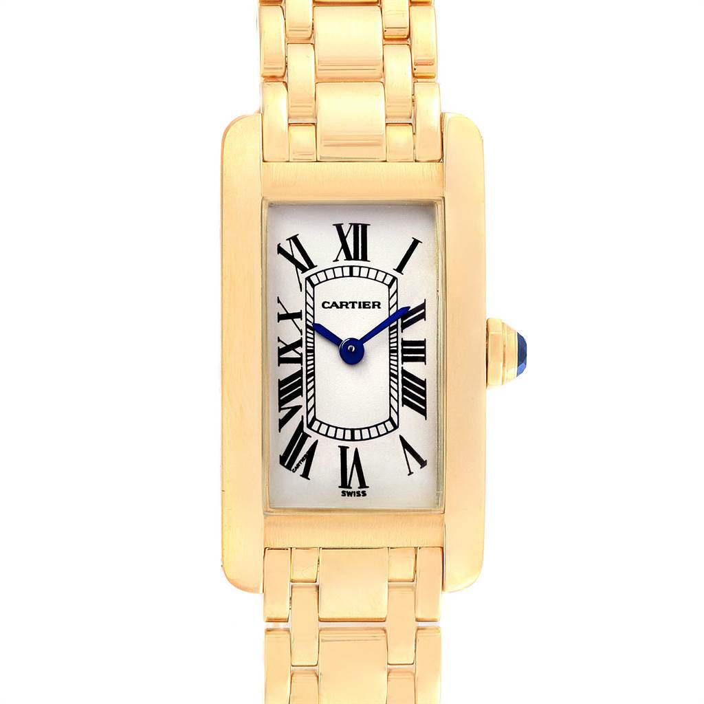 The image shows a frontal view of the Cartier Tank Americaine W26015K2 Women's Yellow Gold Silver Dial W26015K2 Women's Yellow Gold Silver Dial watch, highlighting the face, bezel, crown, and part of the bracelet.