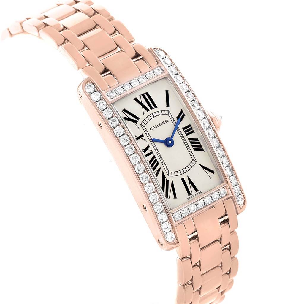 This image shows a Cartier Tank Americaine WB7079M5 Women's Rose Gold Silver Dial WB7079M5 Women's Rose Gold Silver Dial watch, viewed at a slight angle, revealing the face, bracelet, and diamond-set bezel.