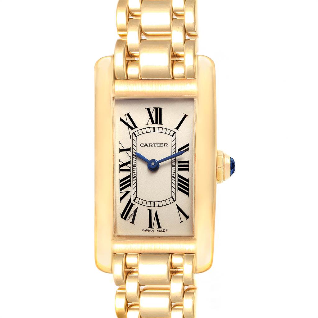 The Cartier Tank Americaine W26015K2 Women's Yellow Gold Silver Dial W26015K2 Women's Yellow Gold Silver Dial watch is shown from a top-down angle, featuring its rectangular face, blue hands, Roman numerals, and gold bracelet.