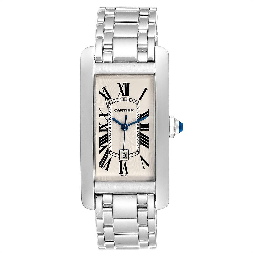 The image shows a front view of the Cartier Tank Américaine watch, highlighting its rectangular face, Roman numerals, blue hands, and metal bracelet.