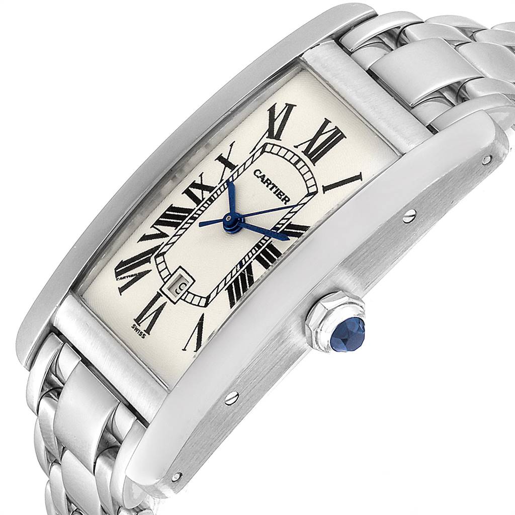 The image shows a Tank Americaine model watch by Cartier at an angled side view, highlighting the face, crown, and bracelet.