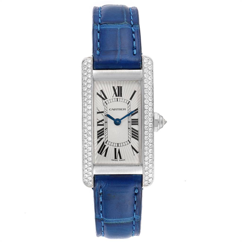 This image shows a front view of the Tank Américaine model by Cartier, featuring its blue leather strap and a diamond-encrusted case.