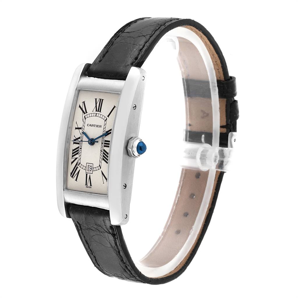 The Cartier Tank Americaine 1726 Women's White Gold Silver Dial 1726 Women's White Gold Silver Dial watch is shown at a three-quarter angle, displaying its rectangular face, Roman numerals, and leather strap.