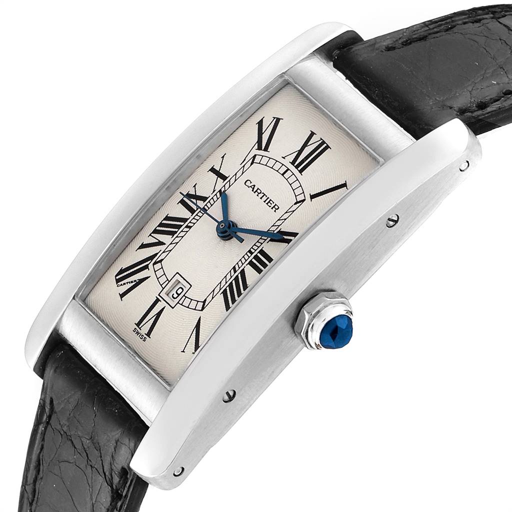 This image shows a Cartier Tank Americaine 1726 Women's White Gold Silver Dial 1726 Women's White Gold Silver Dial watch at a tilted angle, highlighting the face, crown, case, and part of the strap.