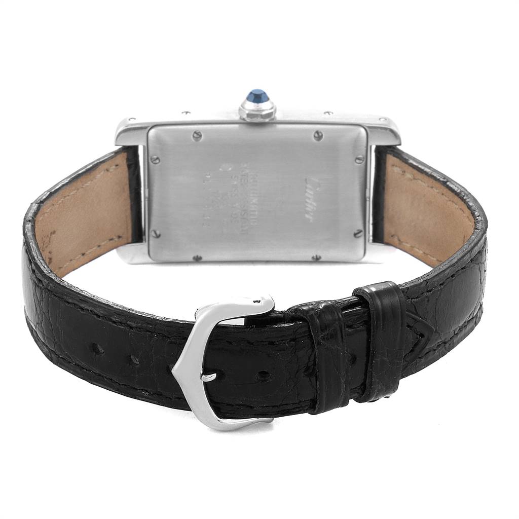 The image shows the back view of a Cartier Tank Americaine 1726 Women's White Gold Silver Dial 1726 Women's White Gold Silver Dial watch, displaying the case back and black leather strap.