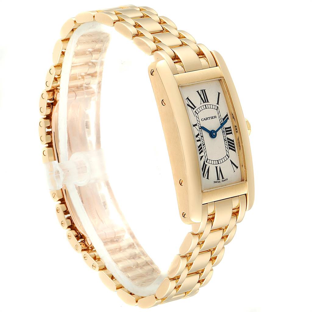 The image shows a Cartier Tank Américaine watch at a slight front angle, highlighting its rectangular face and gold bracelet.