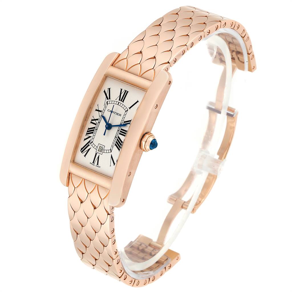 The image shows a Cartier Tank Americaine W2620032 Women's Rose Gold Silver Dial W2620032 Women's Rose Gold Silver Dial watch in a front-side angle with a metal bracelet and a rectangular case.