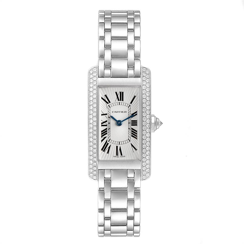 The image shows a frontal view of a Cartier Tank Americaine WB7018L1 Women's White Gold Silver Dial WB7018L1 Women's White Gold Silver Dial watch, featuring its bracelet, dial, and crown.