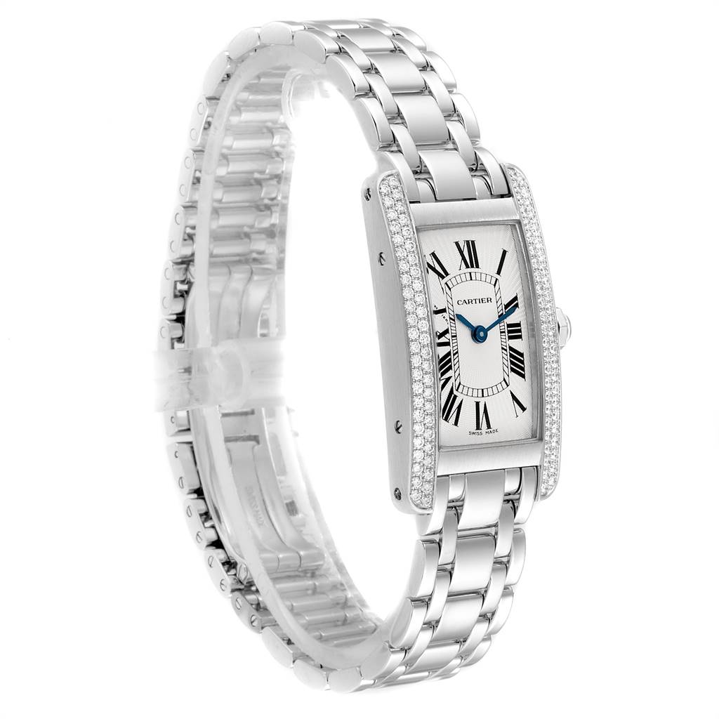 This image shows a Cartier Tank Americaine WB7018L1 Women's White Gold Silver Dial WB7018L1 Women's White Gold Silver Dial watch, featuring its rectangular dial, Roman numerals, and steel bracelet.