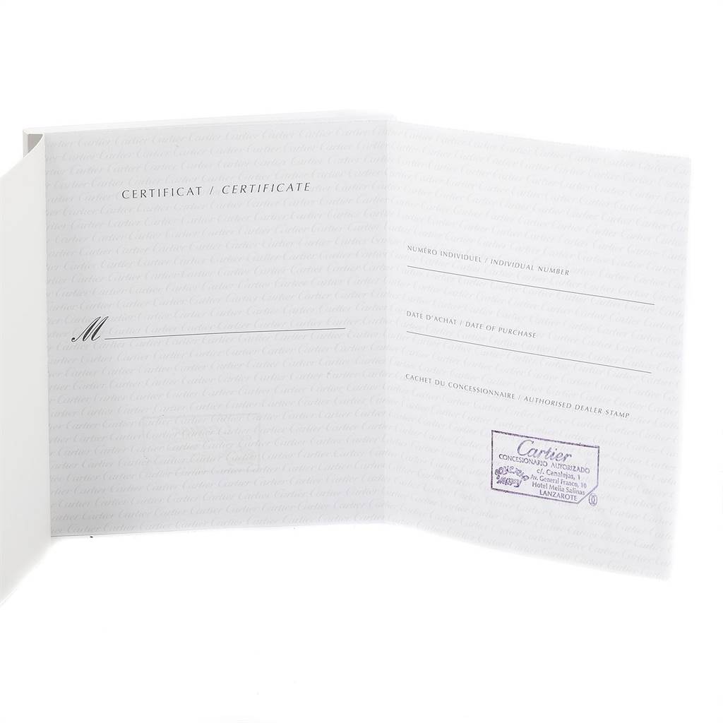 This image shows the certificate and warranty booklet for the Tank Americaine model by Cartier.
