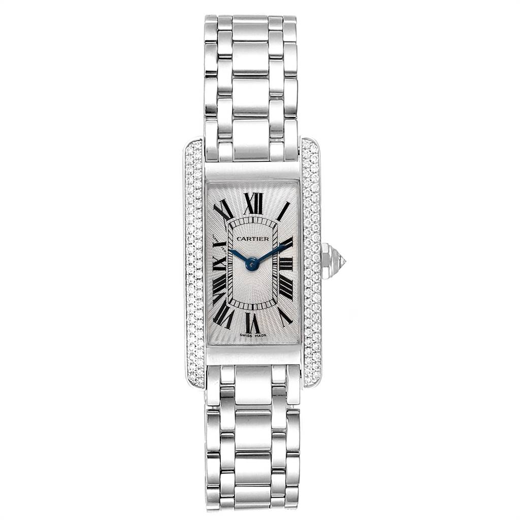 The image shows a front view of the Cartier Tank Americaine WB7018L1 Women's White Gold Silver Dial WB7018L1 Women's White Gold Silver Dial watch, highlighting its rectangular face and metal bracelet.