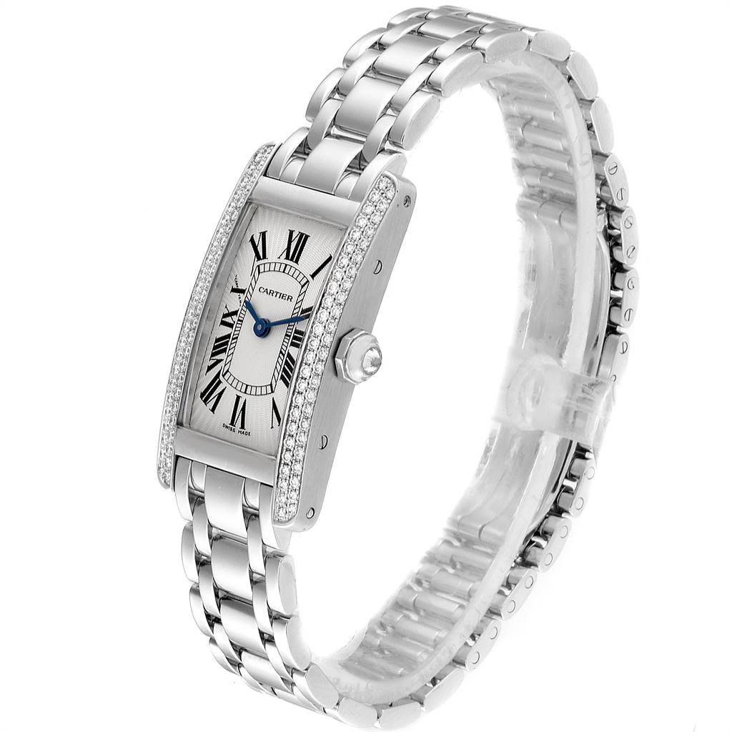 This angle shows a left three-quarters view of the Cartier Tank Américaine watch, including the face, case, bracelet, and crown.