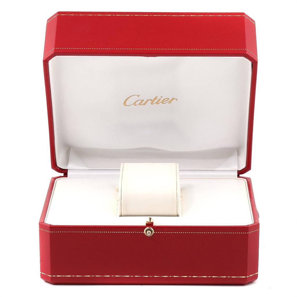 The image shows an empty Cartier Tank Americaine W26015K2 Women
s Yellow Gold Silver Dial W26015K2 Women
s Yellow Gold Silver Dial watch box, open, with white interior and red exterior.