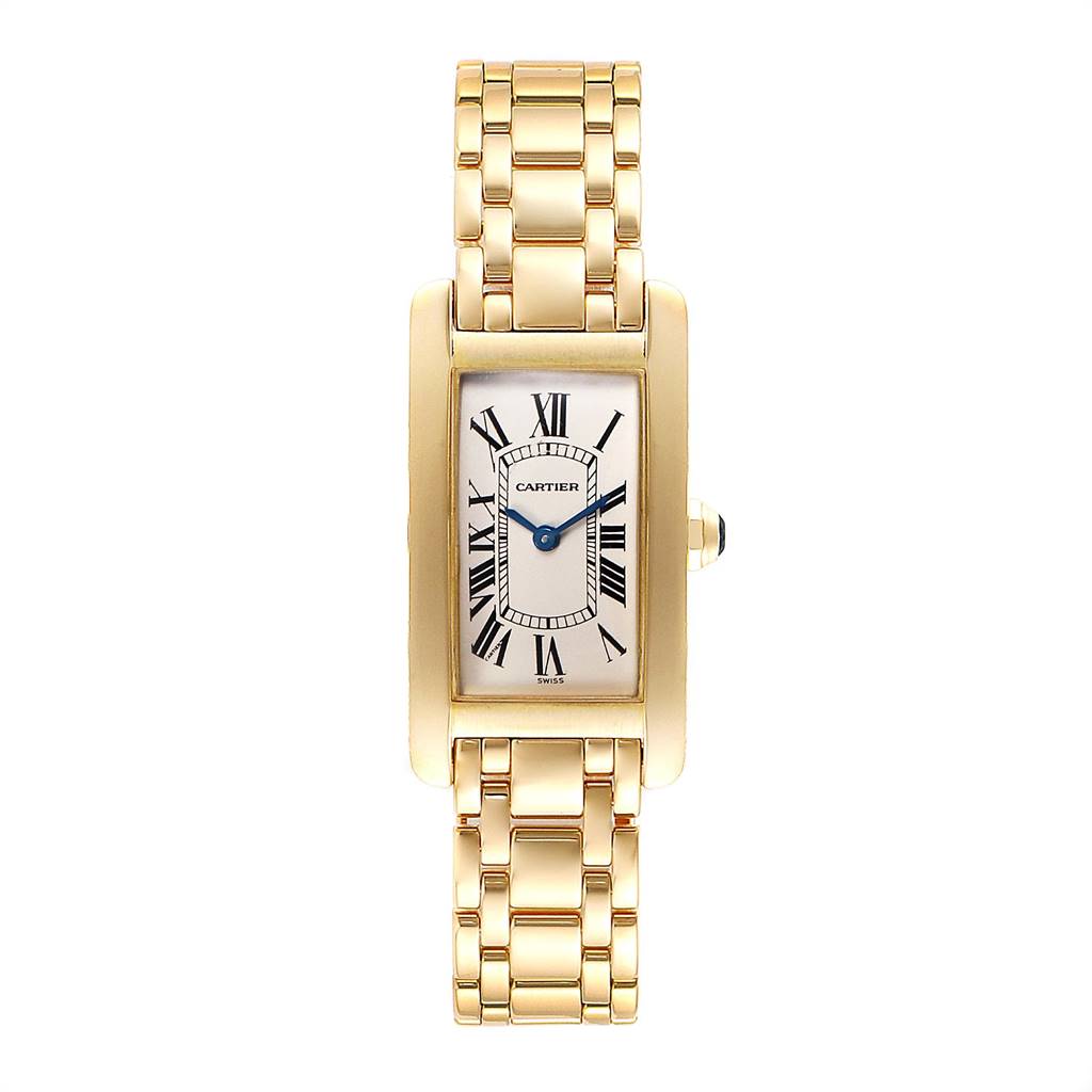 The image shows a front view of a Cartier Tank Americaine W26015K2 Women
s Yellow Gold Silver Dial W26015K2 Women
s Yellow Gold Silver Dial watch, highlighting the rectangular face and gold bracelet.