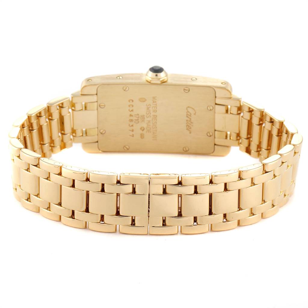This image shows the back view and bracelet of the Cartier Tank Americaine W26015K2 Women
s Yellow Gold Silver Dial W26015K2 Women
s Yellow Gold Silver Dial watch.
