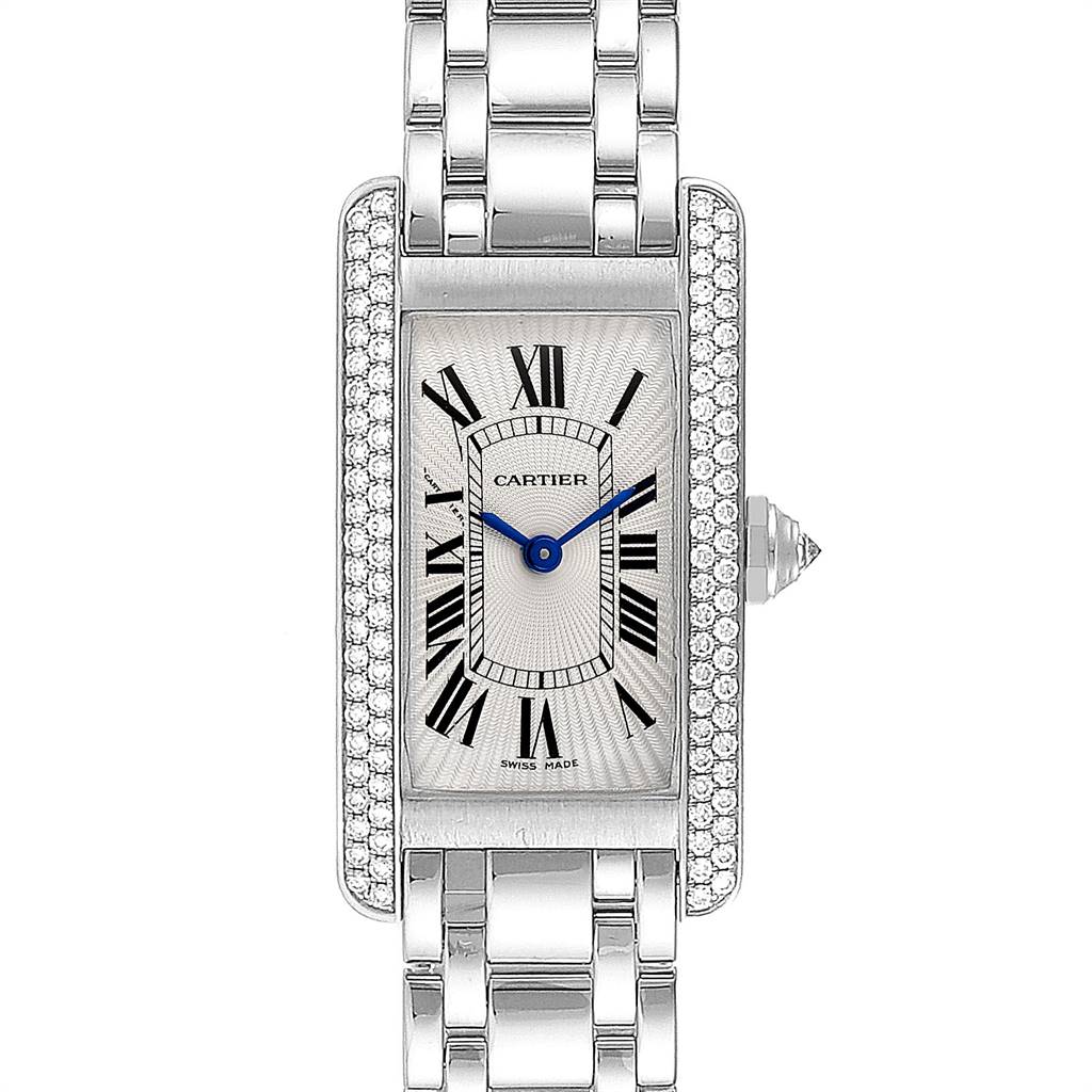 This image displays a Tank Américaine model by Cartier, featuring a rectangular face, Roman numerals, and a metal link bracelet.