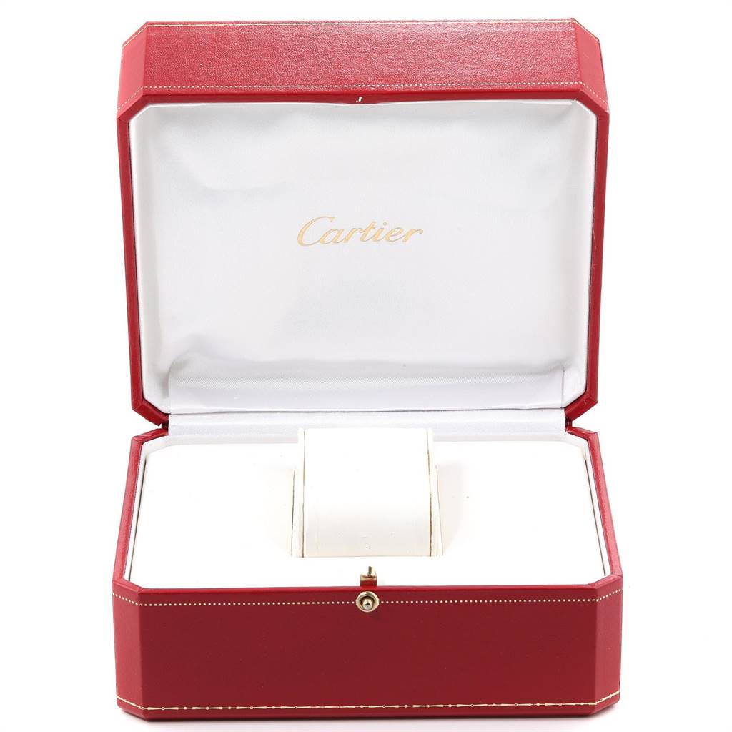 This image shows an open red Cartier box, designed to hold the Tank Americaine model watch.