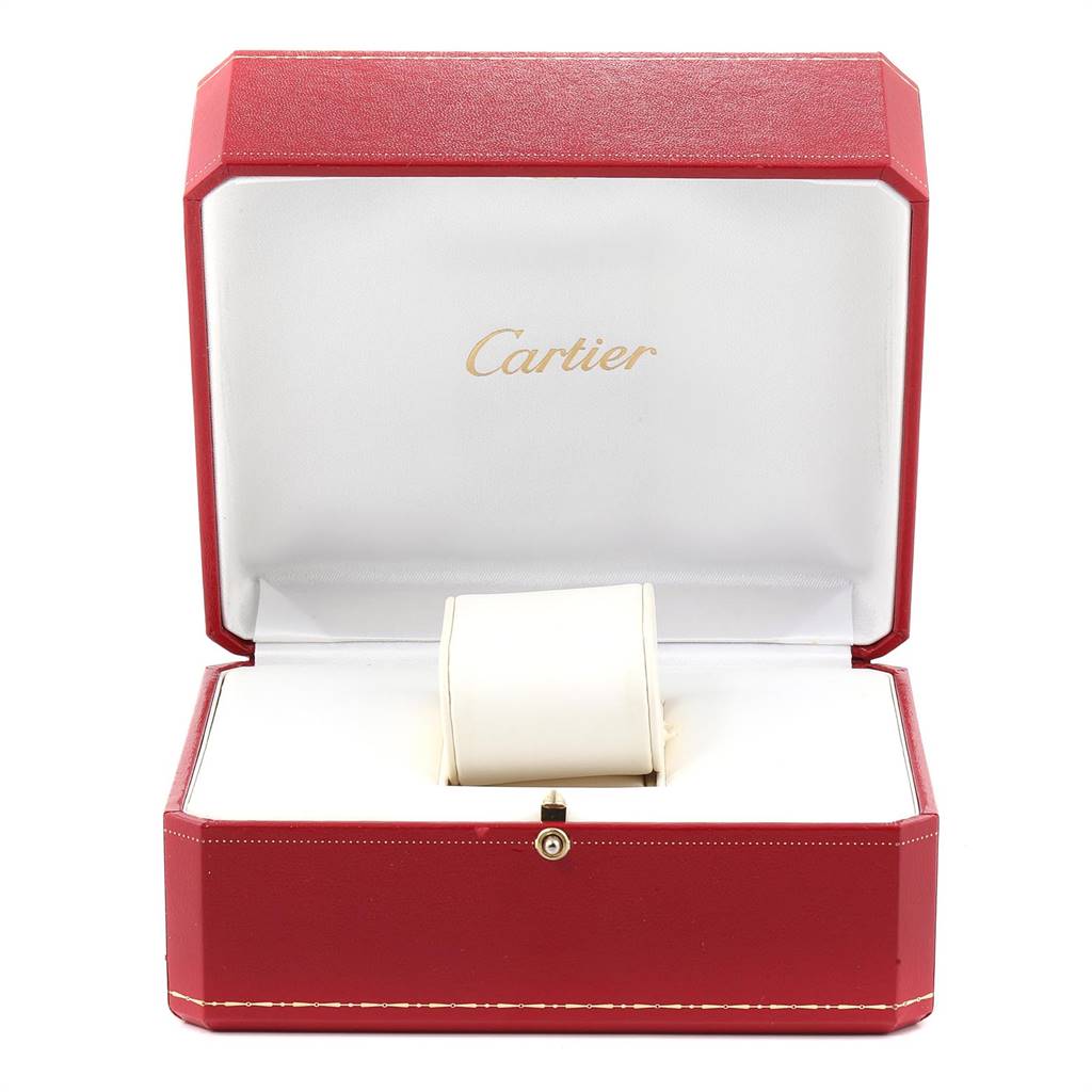 The image shows an empty red Cartier watch box, likely for a Tank Americaine model, with a white cushion inside.