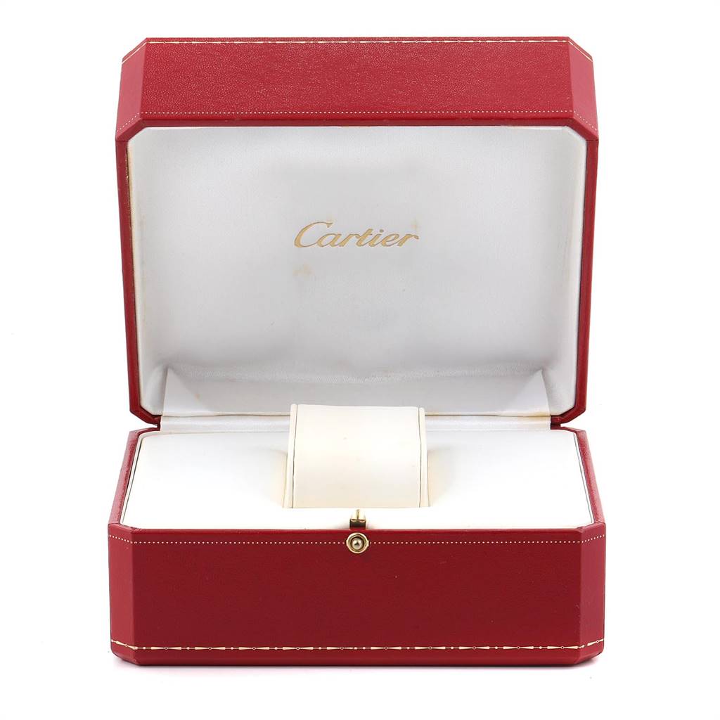 The image shows an open Cartier watch box for the Tank Americaine model, displaying the interior cushioning and logo.