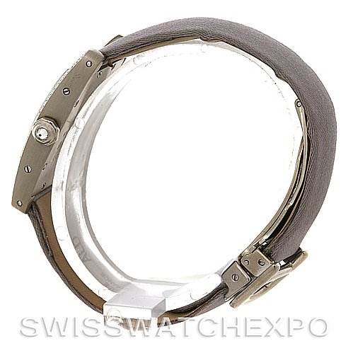 This image shows a side profile of the Cartier Tank Americaine Women
s White Gold Silver Dial Women
s White Gold Silver Dial watch, highlighting the case and strap.