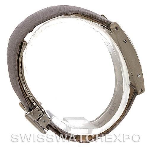 This image shows a side view of the Cartier Tank Americaine Women
s White Gold Silver Dial Women
s White Gold Silver Dial model, highlighting the casing and strap.