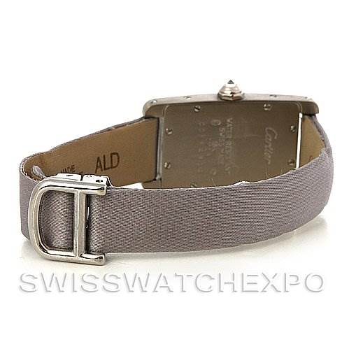 The image shows the back and clasp of a Cartier Tank Americaine Women
s White Gold Silver Dial Women
s White Gold Silver Dial watch at a rear angle.