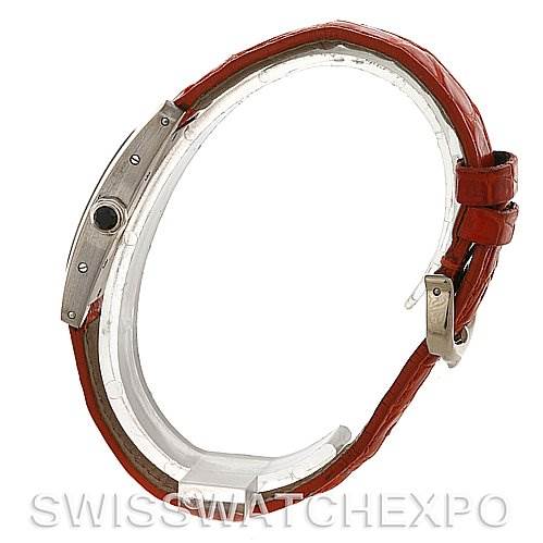 The image shows a side view of the Cartier Tank Americaine W2601956 Women
s White Gold Silver Dial W2601956 Women
s White Gold Silver Dial watch, highlighting the case and red strap.