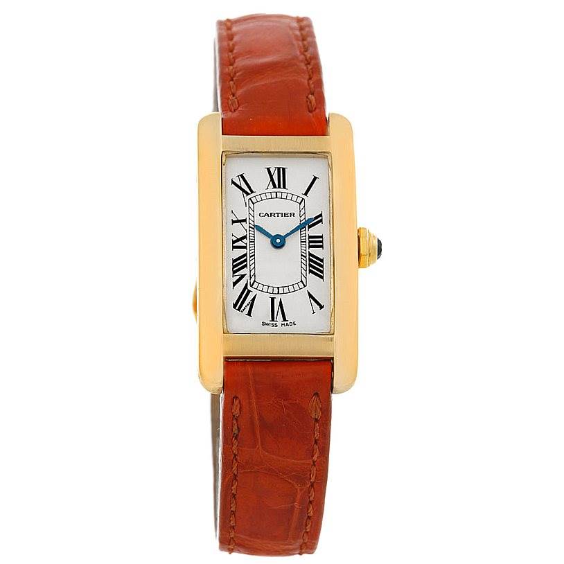The image shows the Cartier Tank Americaine W2601956 Women's Yellow Gold Silver Dial W2601956 Women's Yellow Gold Silver Dial watch from the front, displaying the face, case, crown, and leather strap.