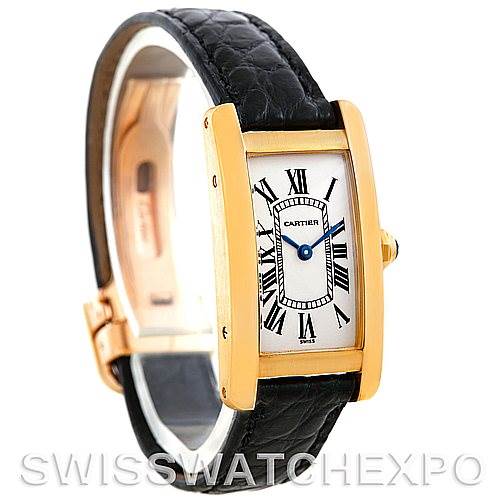 This image shows a Tank Americaine model by Cartier from an angled front view, featuring the watch face, bezel, and a portion of the leather strap.