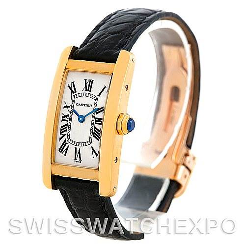 The image shows a Tank Américaine watch by Cartier at a slight side angle, highlighting the face, strap, and clasp.