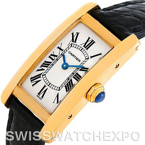 The Cartier Tank Americaine W2601956 Women's Yellow Gold Silver Dial W2601956 Women's Yellow Gold Silver Dial watch is shown at an angled top view, highlighting the face, case, crown, and black leather strap.