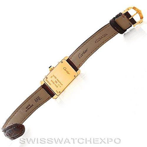 The image shows the back view of a Cartier Tank Americaine W2601956 Women's Yellow Gold Silver Dial W2601956 Women's Yellow Gold Silver Dial watch, displaying the case back, strap, and buckle.