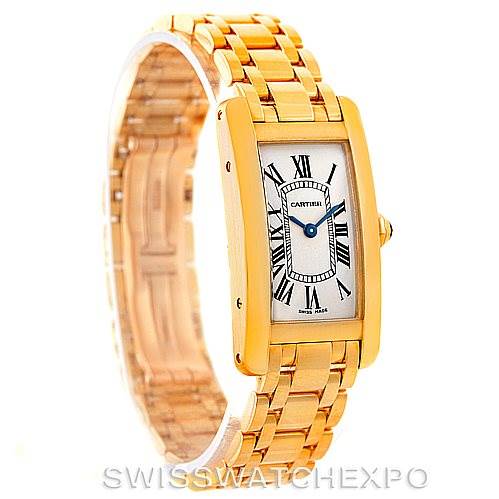 This image shows a three-quarter angled view of a Cartier Tank Americaine W26015K2 Women's Yellow Gold Silver Dial W26015K2 Women's Yellow Gold Silver Dial watch, displaying the face and part of the bracelet.