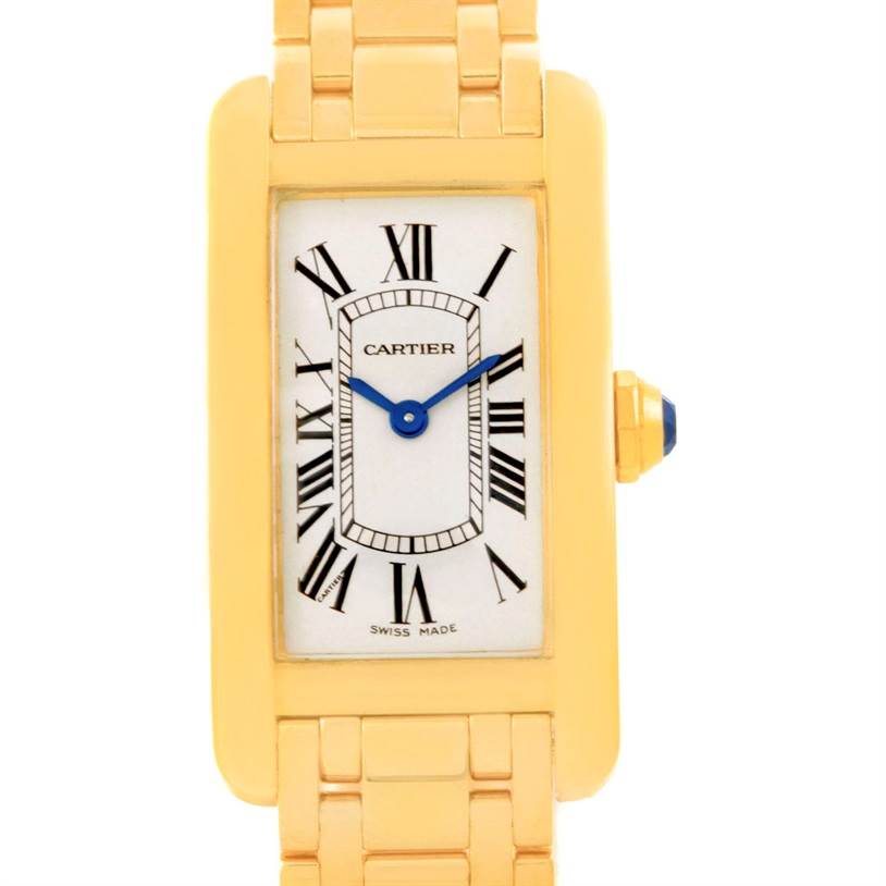 This image shows a front view of the Cartier Tank Americaine W26015K2 Women
s Yellow Gold Silver Dial W26015K2 Women
s Yellow Gold Silver Dial watch, highlighting its rectangular face, Roman numerals, and gold bracelet.