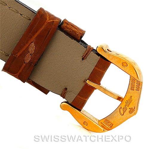 This image shows a close-up of the buckle and strap of a Tank Americaine model by Cartier.