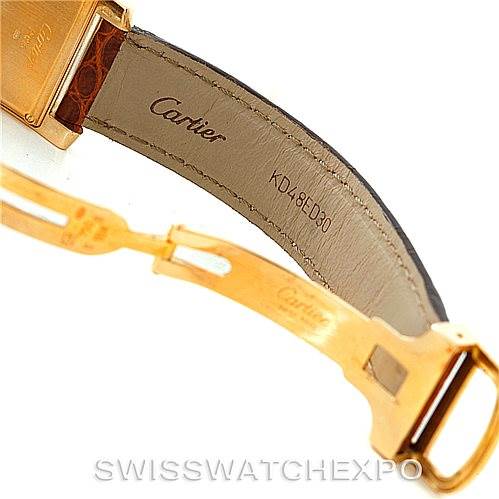 This image shows the clasp and inside of the strap of the Cartier Tank Americaine W2600351 Women's Yellow Gold Silver Dial W2600351 Women's Yellow Gold Silver Dial watch.