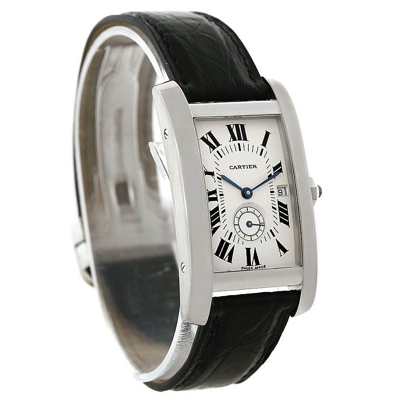 The Cartier Tank Americaine Women
s White Gold Silver Dial Women
s White Gold Silver Dial watch is shown at a slight angle, displaying the front face, side, and leather strap.