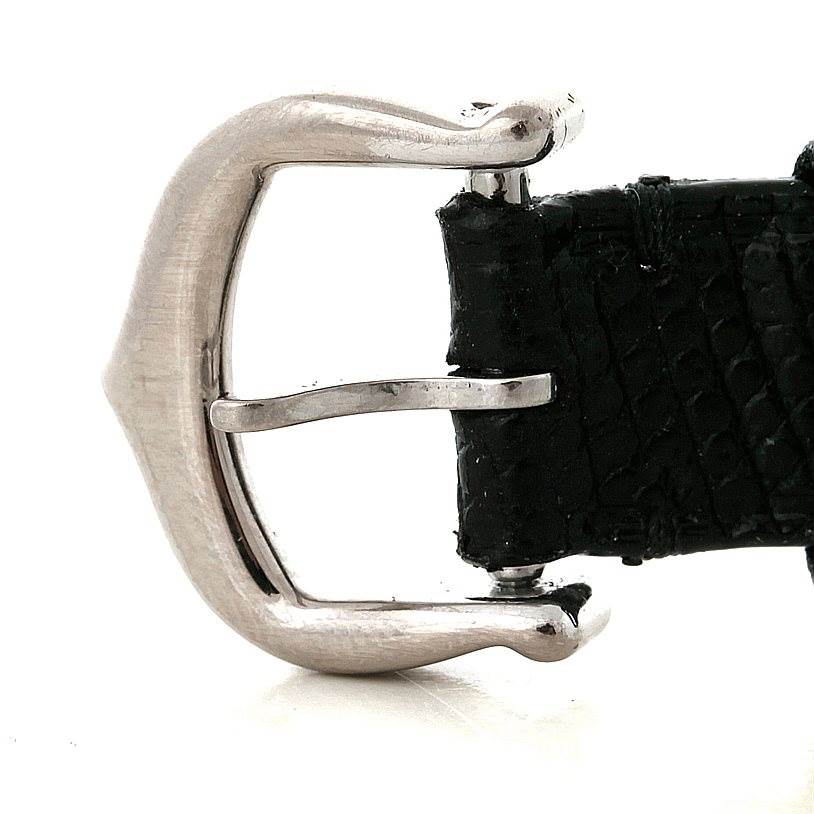 The image shows a close-up side view of the buckle and strap of the Cartier Tank Americaine W2601956 Women
s White Gold Silver Dial W2601956 Women
s White Gold Silver Dial watch.