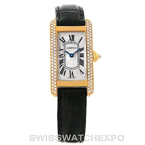 The image shows a front view of the Cartier Tank Americaine W2601956 Women's Yellow Gold Silver Dial W2601956 Women's Yellow Gold Silver Dial watch, highlighting its rectangular face, black leather strap, and diamond-studded bezel.