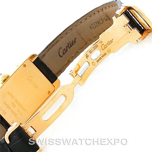 The image shows a partial view of the buckle and inner strap, highlighting the clasp mechanism of the Cartier Tank Américaine watch.