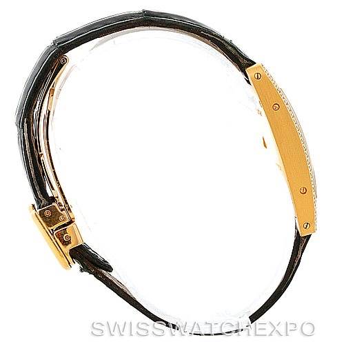 This image shows a side view angle of the Cartier Tank Americaine W2601956 Women's Yellow Gold Silver Dial W2601956 Women's Yellow Gold Silver Dial watch, highlighting the case and strap attachment.