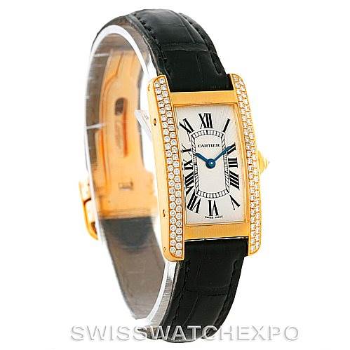 The image shows a Cartier Tank Americaine W2601956 Women's Yellow Gold Silver Dial W2601956 Women's Yellow Gold Silver Dial watch at a slight side angle, highlighting its rectangular face, diamond bezel, and leather strap.