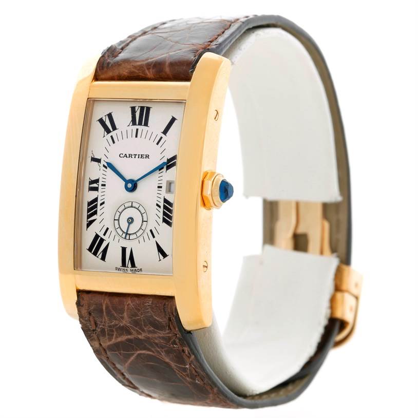 The image shows a Cartier Tank Americaine W2600351 Yellow Gold Silver Dial W2600351 Yellow Gold Silver Dial watch viewed at a three-quarter angle, highlighting its face, case, crown, and leather strap.