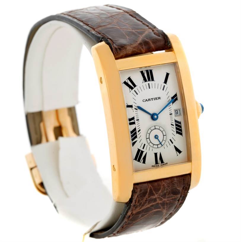 The image shows a Cartier Tank Américaine watch at a three-quarter angle, displaying its face, strap, and side profile.