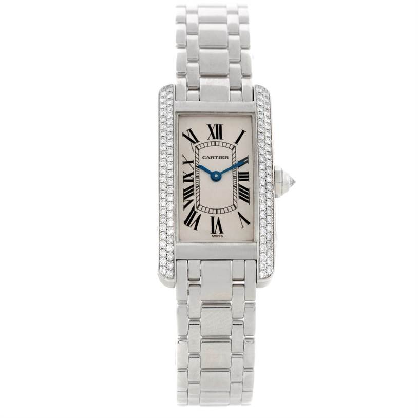 This image shows a Cartier Tank Americaine W2601956 Women
s White Gold Silver Dial W2601956 Women
s White Gold Silver Dial watch from a front angle, highlighting its face, Roman numerals, and linked bracelet.