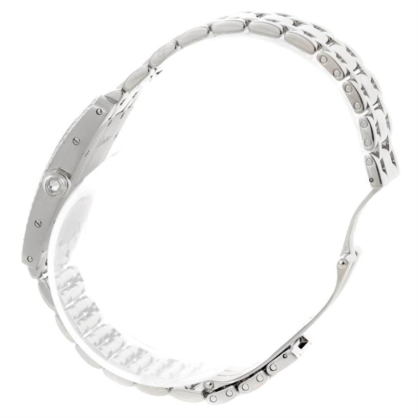 The image shows a side view of a Cartier Tank Americaine W2601956 Women
s White Gold Silver Dial W2601956 Women
s White Gold Silver Dial watch, focusing on its metal strap and casing.