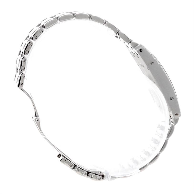 The image shows a side view of the Cartier Tank Americaine W2601956 Women
s White Gold Silver Dial W2601956 Women
s White Gold Silver Dial watch, highlighting its metal bracelet and clasp mechanism.