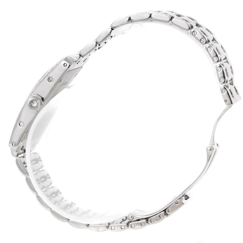 The image shows a side profile of a Cartier Tank Américaine watch, focusing on the bracelet and side case.