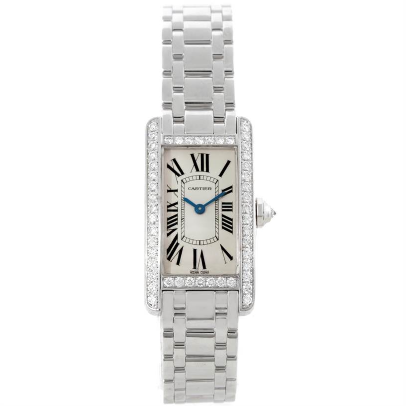 The image shows a front view of a Cartier Tank Americaine WB707331 Women
s White Gold Silver Dial WB707331 Women
s White Gold Silver Dial watch, showcasing its face, bezel, and bracelet.