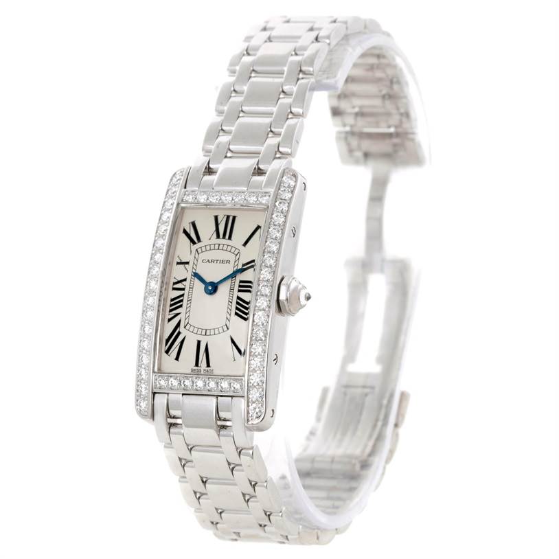 The Cartier Tank Americaine WB707331 Women
s White Gold Silver Dial WB707331 Women
s White Gold Silver Dial watch is shown from a front angle, displaying its face, bracelet, and side crown.
